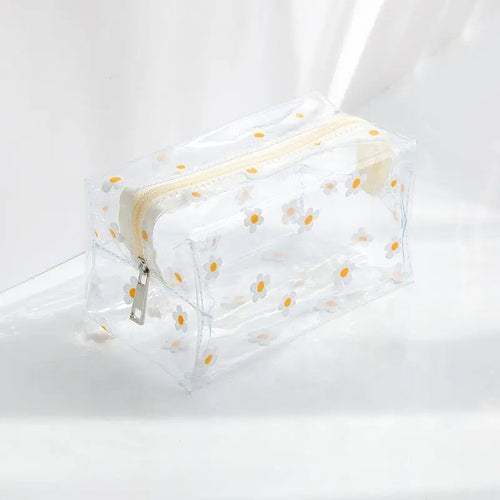 trousse toilette femme transparente marguerites