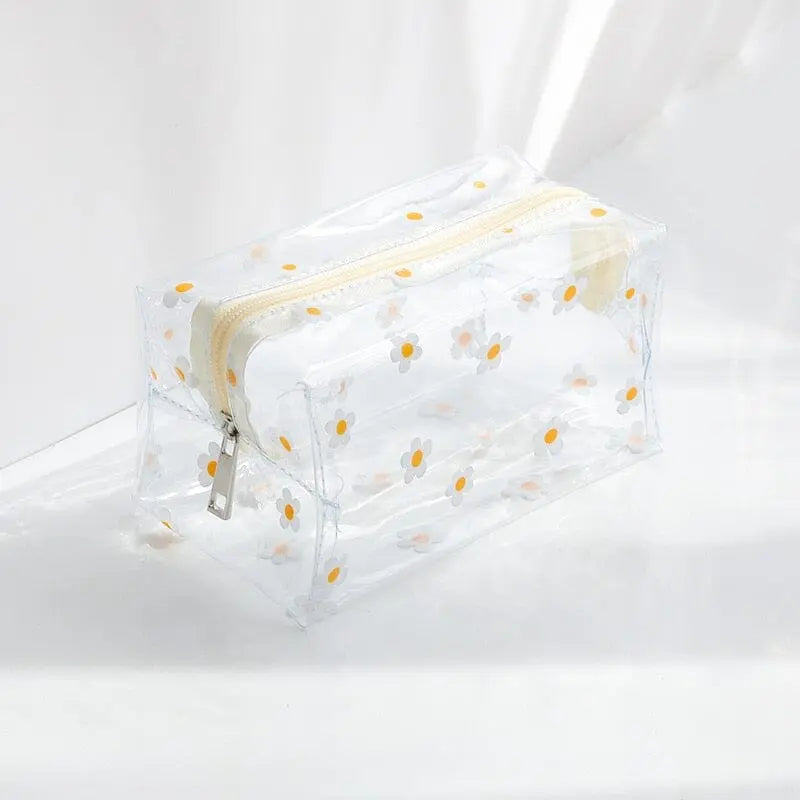 trousse toilette femme transparente marguerites