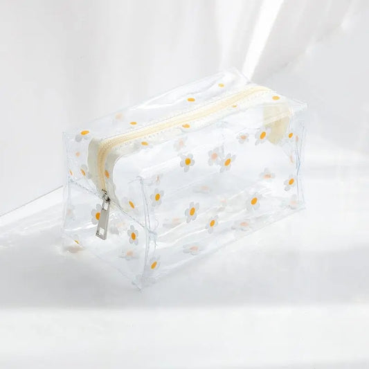trousse toilette femme transparente marguerites