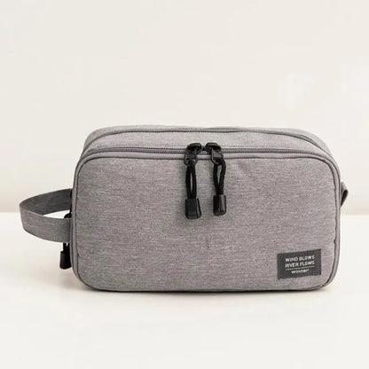 trousse de toilette de voyage wind blows river flows